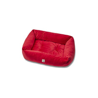 Red velvet dog sofa: bold elegance and enveloping comfort